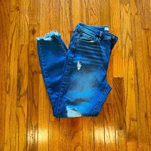 Distressed KanCan Denim with Shark-bite Hem